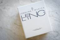 The name of the Munich perfumery "Lengling Munich" and the name of the perfume "eisbach" are printed on a white cardboard box with a linen look.